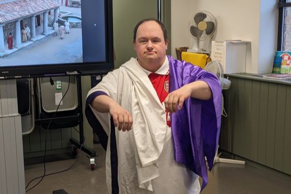 A man dressed as a Roman