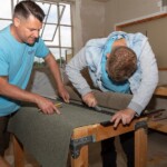 Supervising one of the Upcycling team cutting some roofing felt